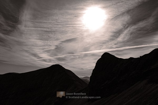 Photo of Lord Reays Seat, Foinaven, silhouetted against a low autumn sun
