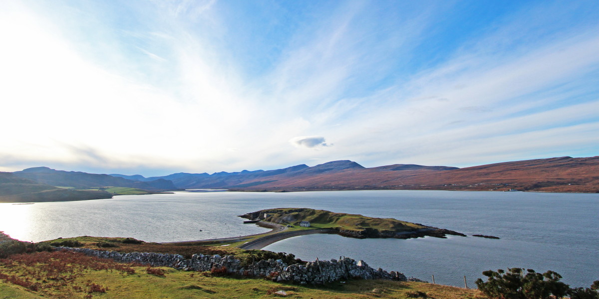 Photo of Loch Eriboll with the peninsula of Ard Neakie and Foinaven, Cranstackie and Beinn Spionnaidh beyond