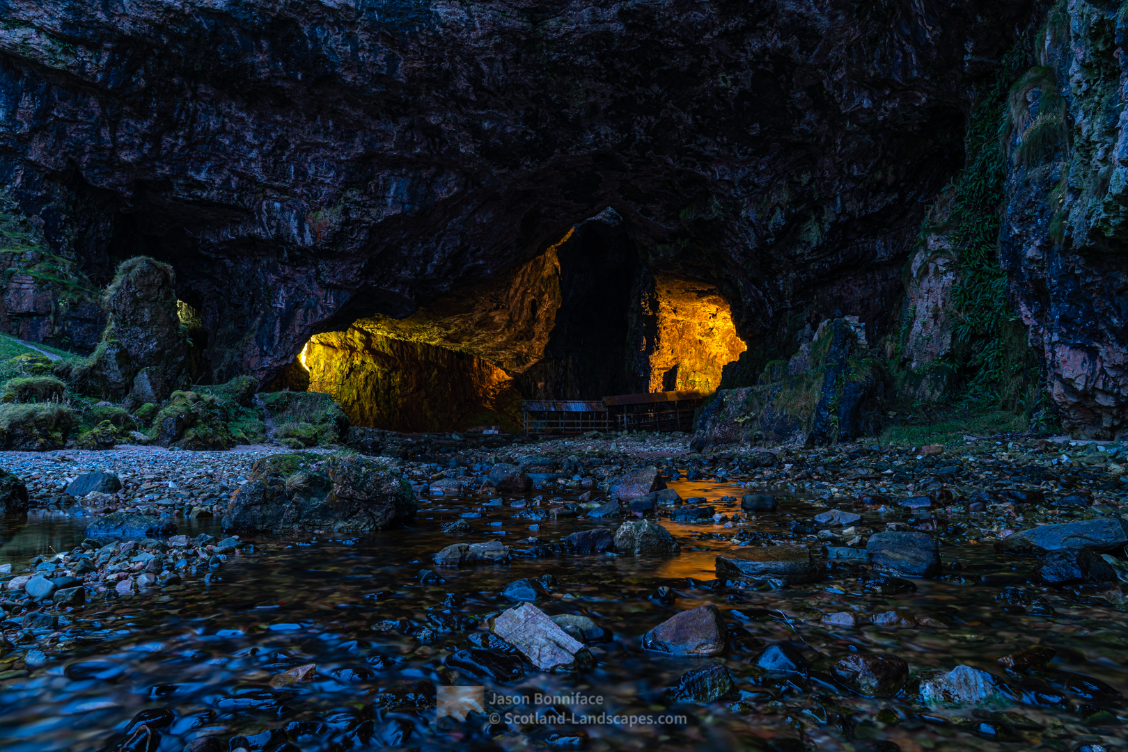 A long exposure view into Smoo Cave at Dusk with very little water flowing. The waterfall in the cave was dry