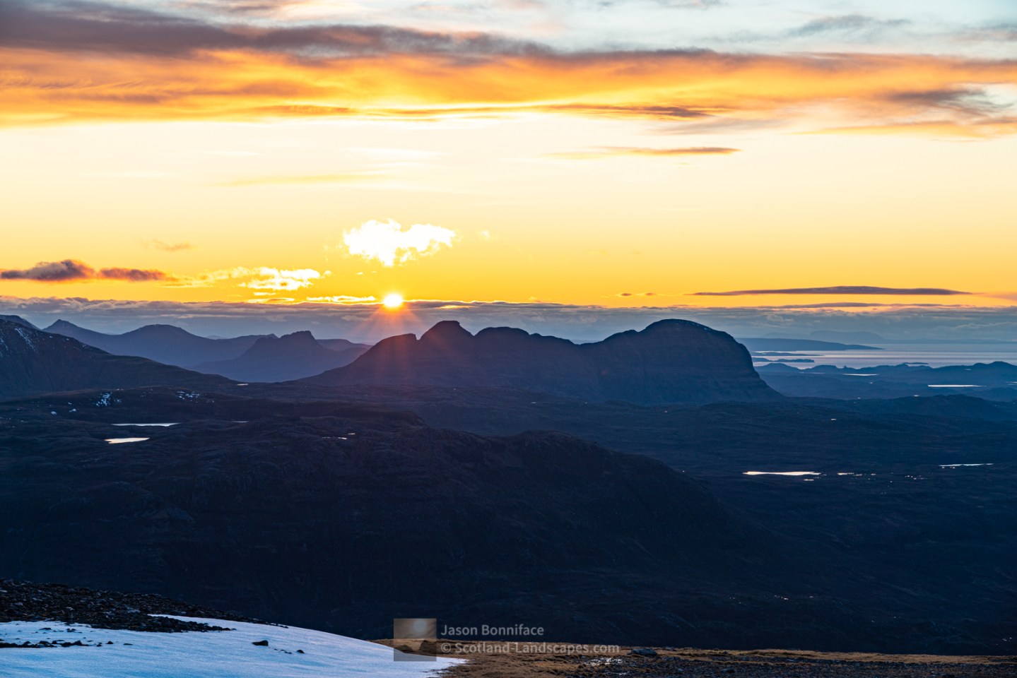 The last of the sun behind Suilven